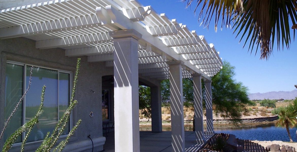 White lattice patio cover shade water