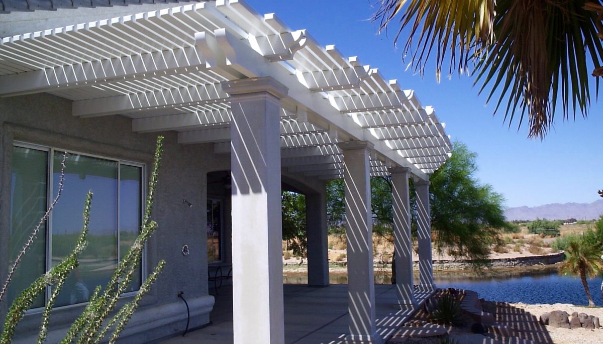 White lattice patio cover shade water