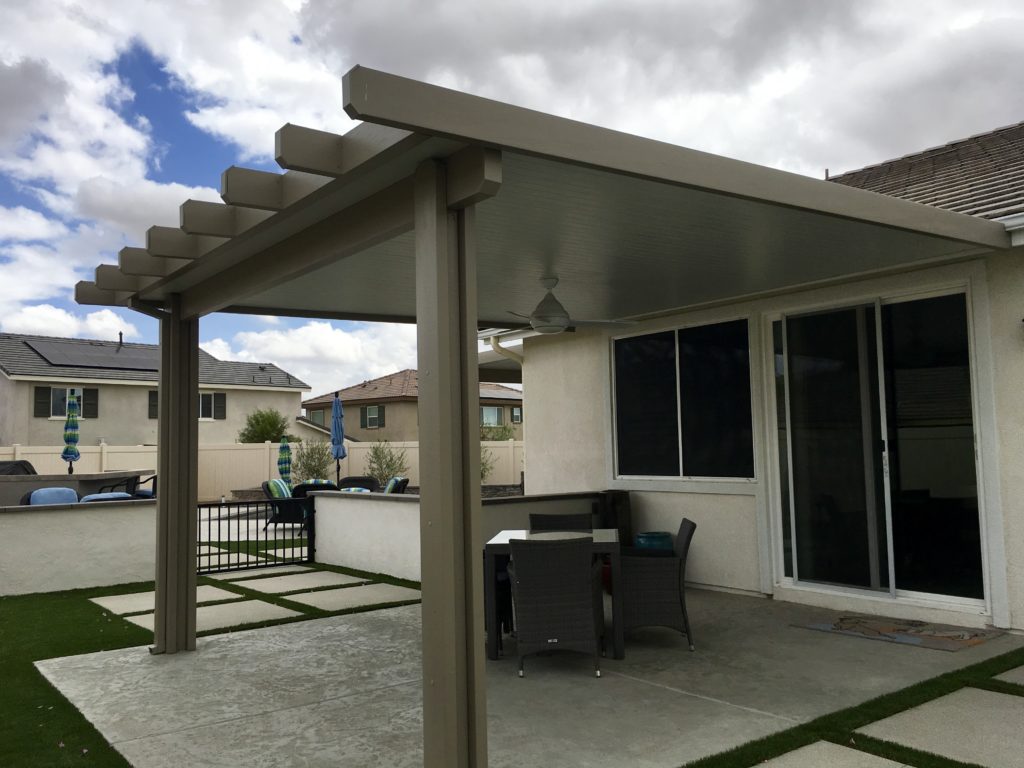 Solid patio cover and sliding white backdoors