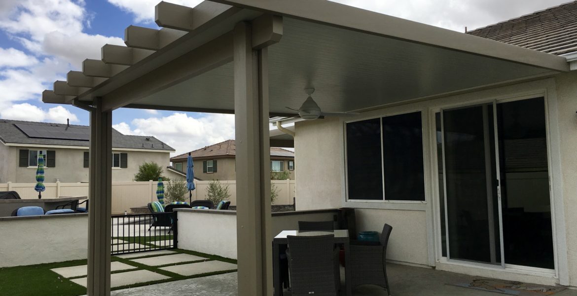 Solid patio cover and sliding white backdoors